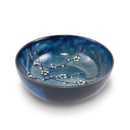 Saladier japonais avec cerisier en motif sur fond bleu foncé.