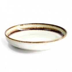 Saladier japonais avec cerisier en motif sur fond bleu foncé.