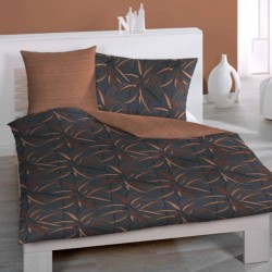 Linge de lit WILLOW sur un lit, housse et taies en satin de coton réversibles