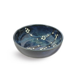 Saladier japonais avec cerisier en motif sur fond bleu foncé.