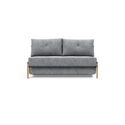 Modulable avec une structure en métal, pieds et accoudoirs en chêne massif.