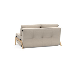 Modulable avec une structure en métal, pieds et accoudoirs en chêne massif.