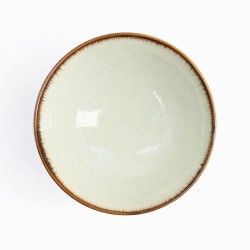 Saladier japonais avec cerisier en motif sur fond bleu foncé.