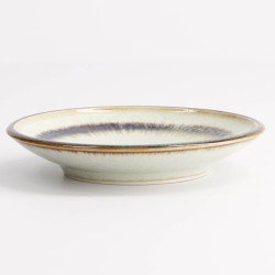 Saladier japonais avec cerisier en motif sur fond bleu foncé.