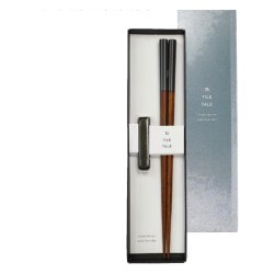 Coffret baguettes japonaises TILE TALE anthracite ouvert, à côté de son couvercle