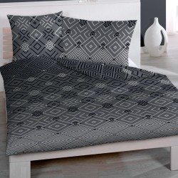 Linge de lit TREND sur un lit, housse de couette et taies en satin de coton